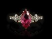 Burmese ruby and diamond flanked solitaire ring, circa 1915. 