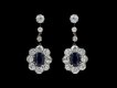 Sapphire and diamond cluster earrings, circa 1920.Sapphire and diamond cluster earrings, circa 1920.