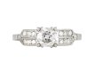 Diamond flanked solitaire ring, American, circa 1940.