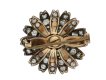 Victorian yellow sapphire and diamond flower brooch, circa 1880.