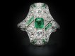 Edwardian emerald and diamond cluster ring, circa 1910.