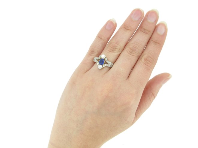 hand view Antique sapphire and diamond ring, circa 1905.
