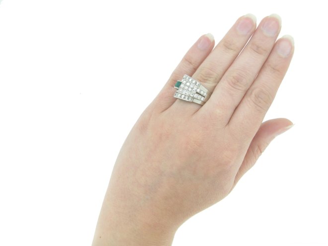 decorated with eight round single cut diamonds in closed back grain settings with a combined weight of 0.10 carats.