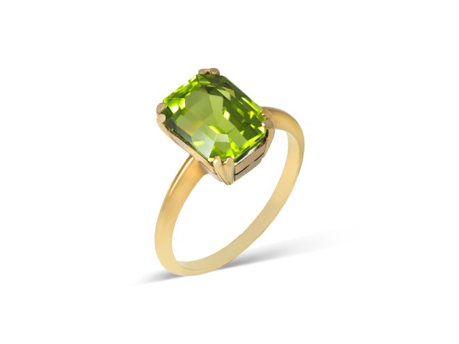 Peridot solitaire ring, circa 1940s. 