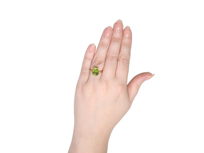 Peridot solitaire ring, circa 1940s. 