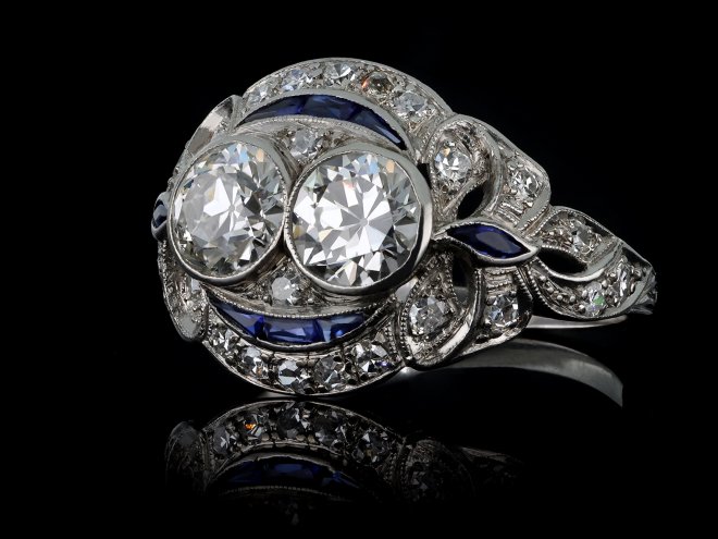 Two stone diamond and synthetic sapphire cluster ring, circa 1920.