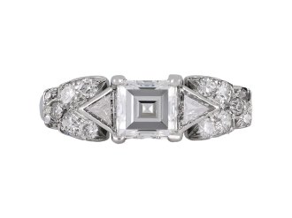 Vintage diamond flanked solitaire ring, circa 1950.