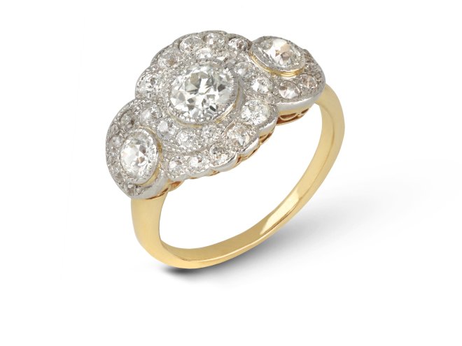 Edwardian diamond triple cluster ring, circa 1905.