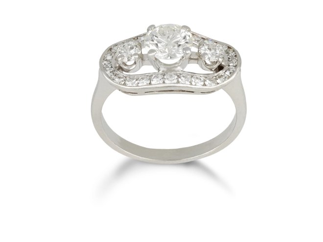 Three stone diamond cluster ring, circa 1950.