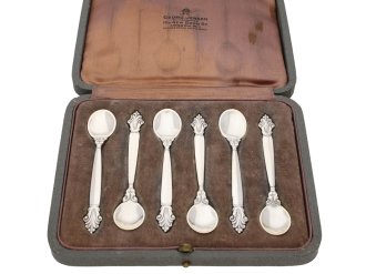 A boxed set of Georg Jensen silver spoons