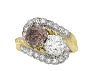 Vintage fancy coloured diamond crossover ring, circa 1950. Hatton Garden