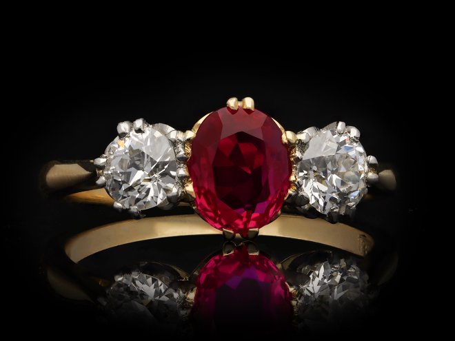 Edwardian Burmese ruby and diamond three stone ring, circa 1910. Hatton Garden