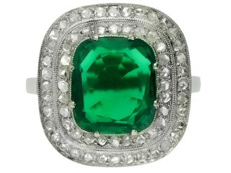 Emerald and diamond cluster ring, circa 1920.