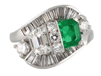 Colombian emerald and diamond crossover ballerina ring, circa 1950.