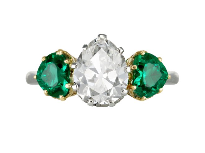 Drop shape old mine diamond and Colombian emerald ring, circa 1920.