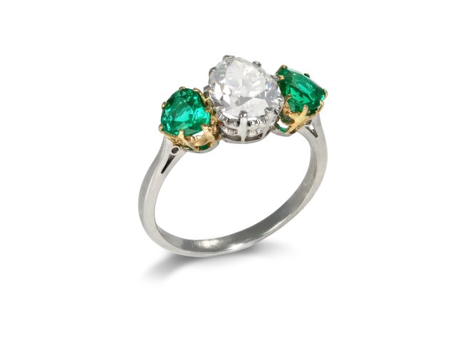 Drop shape old mine diamond and Colombian emerald ring, circa 1920.