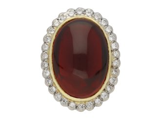 Cabochon garnet and diamond coronet cluster ring, circa 1960.