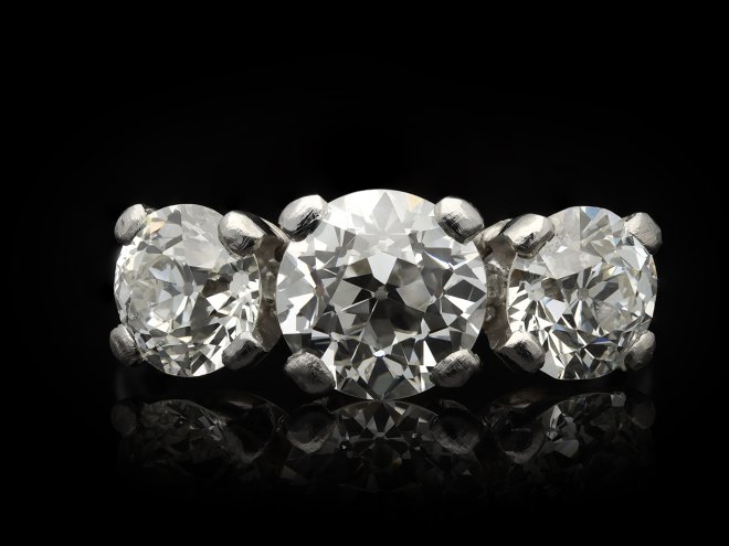 Three stone old cut diamond ring by Jabel hatton garden