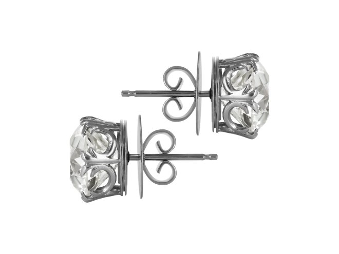 Emerald cut diamond solitaire ring, circa 1950.