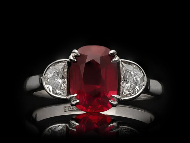 Ruby and diamond three stone ring, circa 1990. Hatton Garden