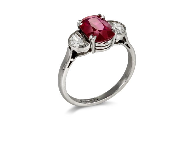 Ruby and diamond three stone ring, circa 1990. Hatton Garden
