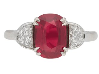 Ruby and diamond three stone ring, circa 1990.