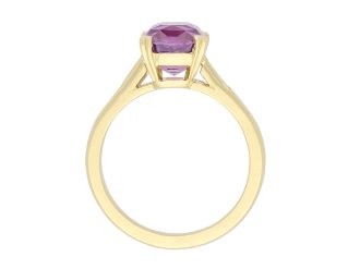 Purple sapphire and diamond flank solitaire ring, circa 1980. Hatton Garden