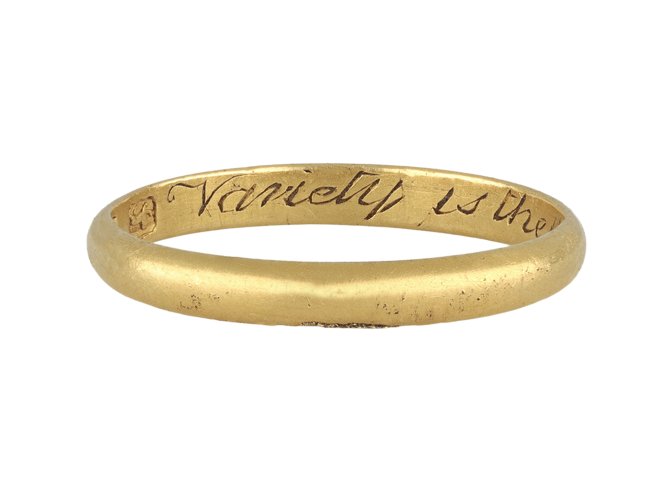 Gold posy ring, 'Variety is the Beauty of ye World', circa 19th century.
