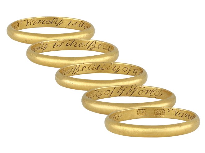 Gold posy ring, 'Variety is the Beauty of ye World', circa 19th century.