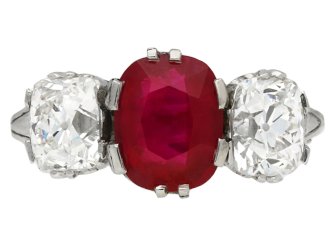Edwardian Burmese ruby and diamond three stone ring, English, circa 1910.