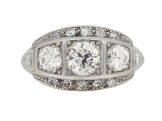 Diamond three stone cluster ring, circa 1930.