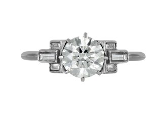 Art Deco diamond flanked solitaire ring, circa 1930.