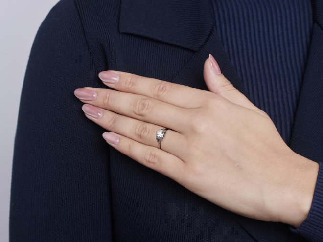 Art Deco diamond flanked solitaire ring, circa 1930.