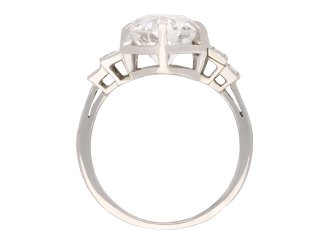 Solitaire diamond engagement ring with diamond set shoulders, French, circa 1930. Hatton Garden