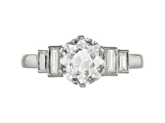 Art Deco diamond flanked solitaire ring, circa 1935.