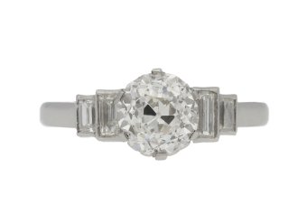 Art Deco diamond flanked solitaire ring, circa 1935.