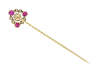 Antique natural pearl, ruby and diamond pin, circa 1905.   