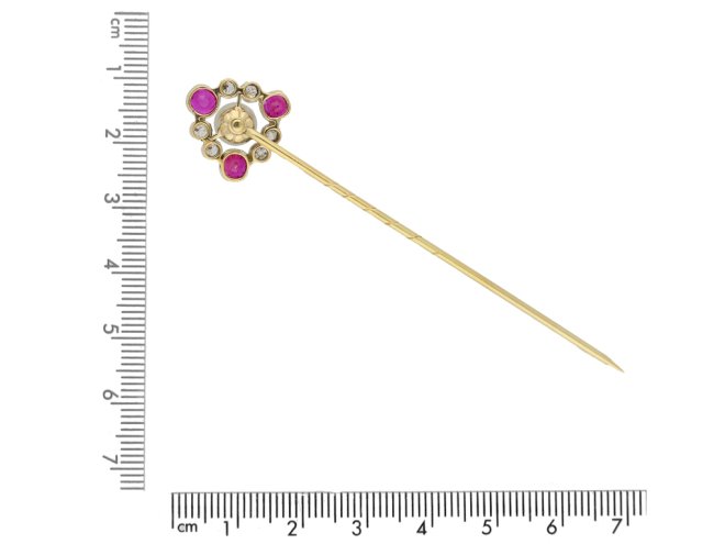 Antique natural pearl, ruby and diamond pin, circa 1905.   
