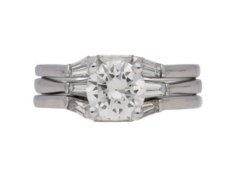 Vintage diamond ring with a pair of matching diamond bands, English, circa 1970.