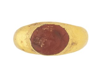 front view Ancient Roman cornelian intaglio of Fortuna, circa mid 2nd mid 3rd century AD.