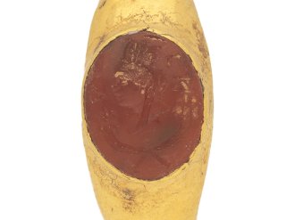 close up view Ancient Roman cornelian intaglio of Fortuna, circa mid 2nd mid 3rd century AD.