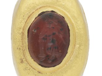 close up view Ancient Roman signet ring with cornelian intaglio of Mercury