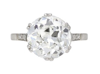 Old cut diamond flanked solitaire ring, English, circa 1920. Hatton Garden