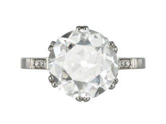 4.01 carat old cut diamond flanked solitaire ring, English, circa 1920. 