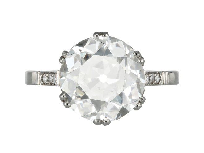 4.01 carat old cut diamond flanked solitaire ring, English, circa 1920. 