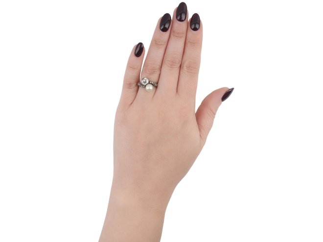 Antique diamond and pearl crossover ring, circa 1890.   