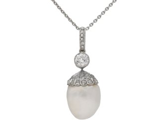 Natural pearl and diamond pendant, circa 1905.
