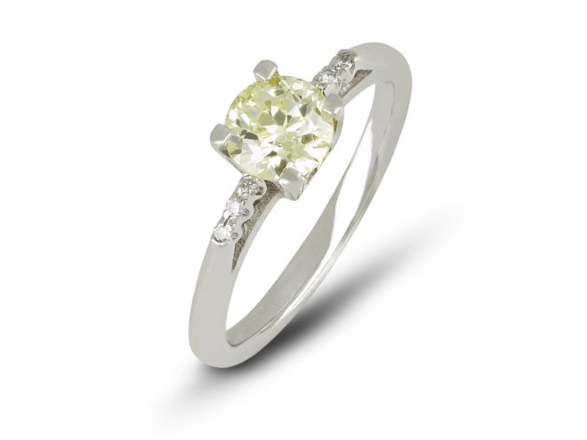 Fancy yellow diamond solitaire ring, English, circa 1950. 