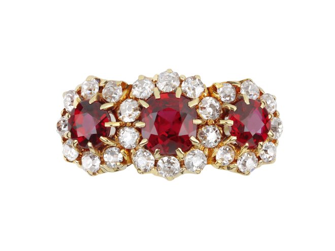Edwardian ruby and diamond triple cluster ring, English, circa 1905.