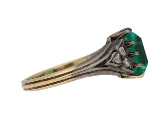 Antique Colombian emerald and rose cut diamond flanked solitaire ring, circa 1860.